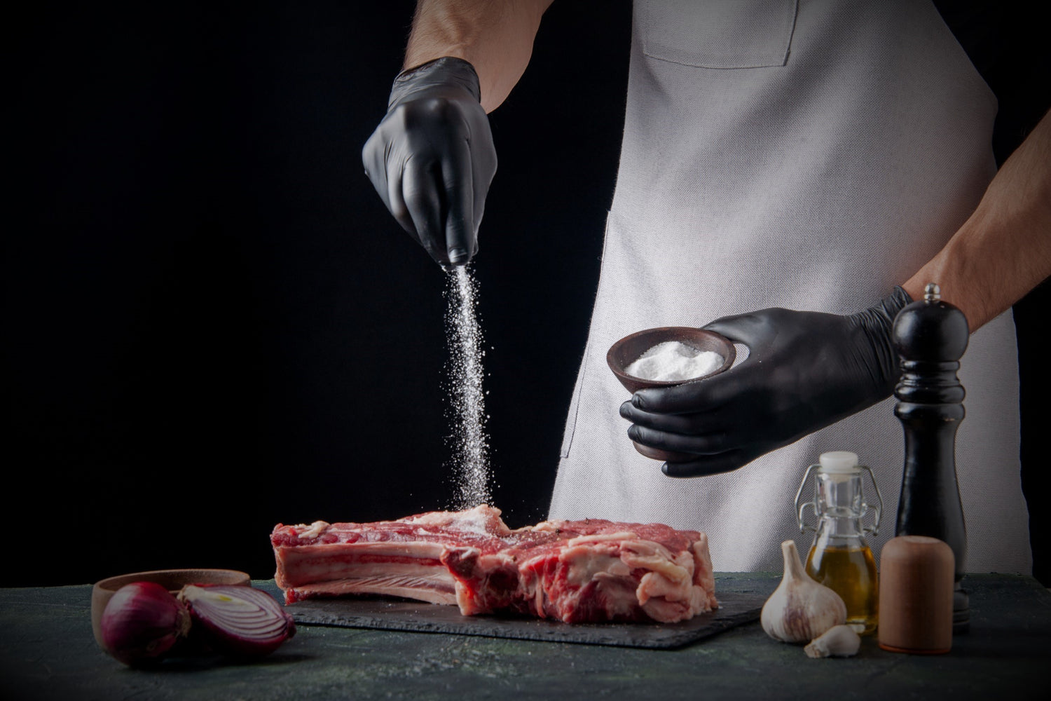 chef salting steak